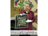 Virginia Siciliano assisting husband, George, with presentation.