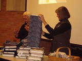 Jacquie Atkins and Sharon Yurkanin from Allentown Art Museum of the Lehigh Valley discussing Katagami and Red Rooster fabrics.