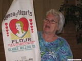 Barbara Garrett showing one of her many feed sacks.